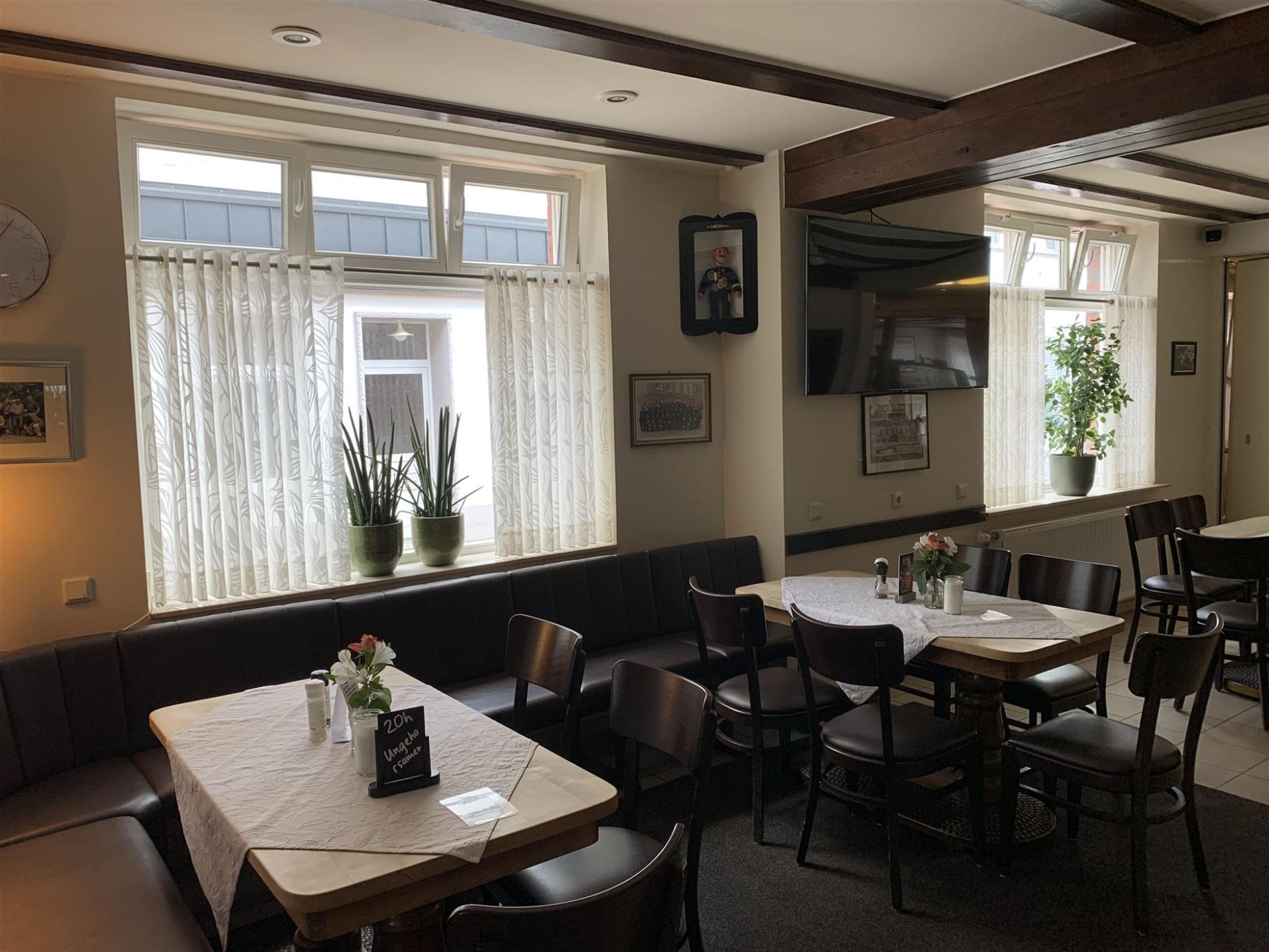 Tables by the window in the café.