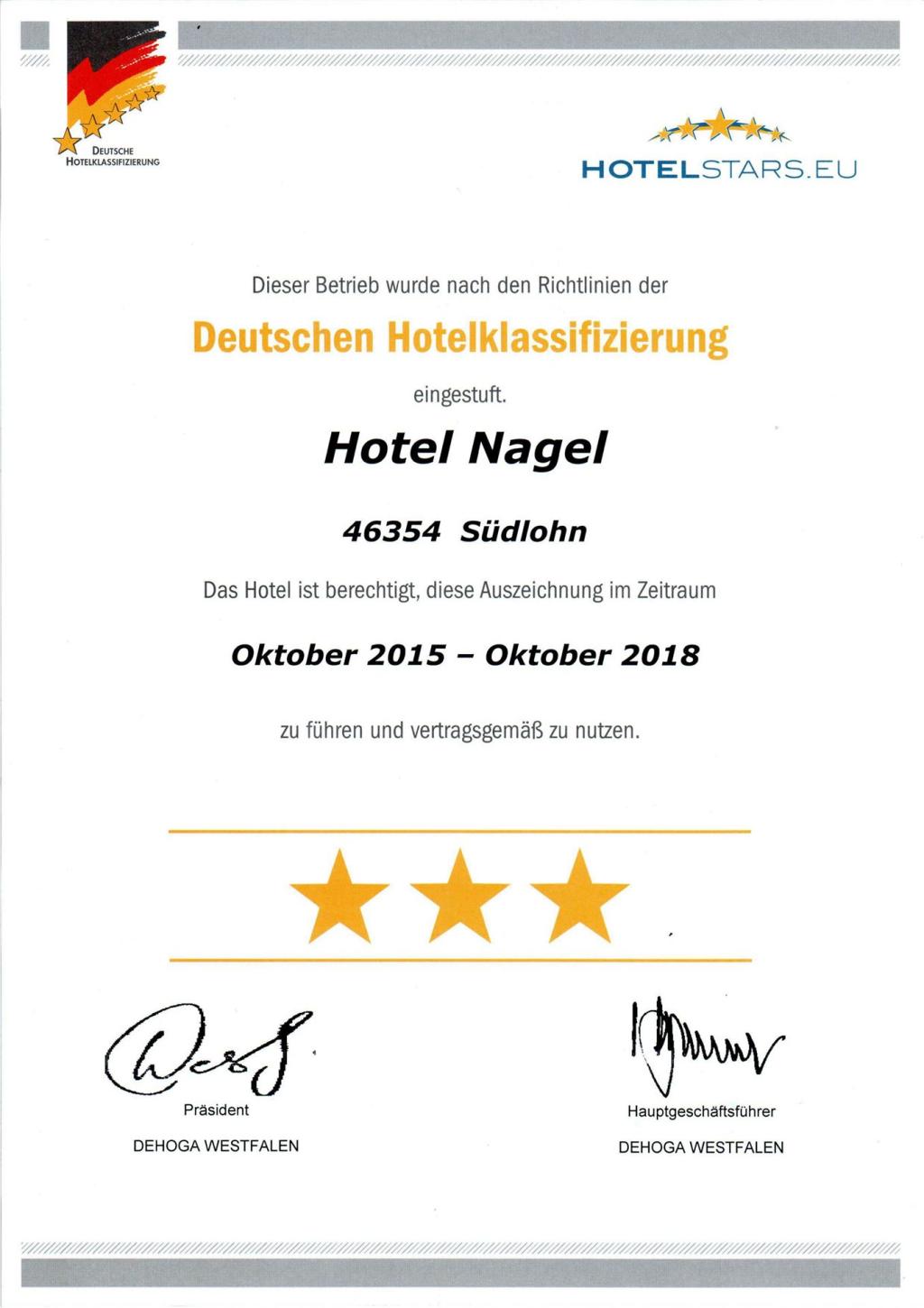 Photo shows a certificate of German hotel classification with 3 stars.