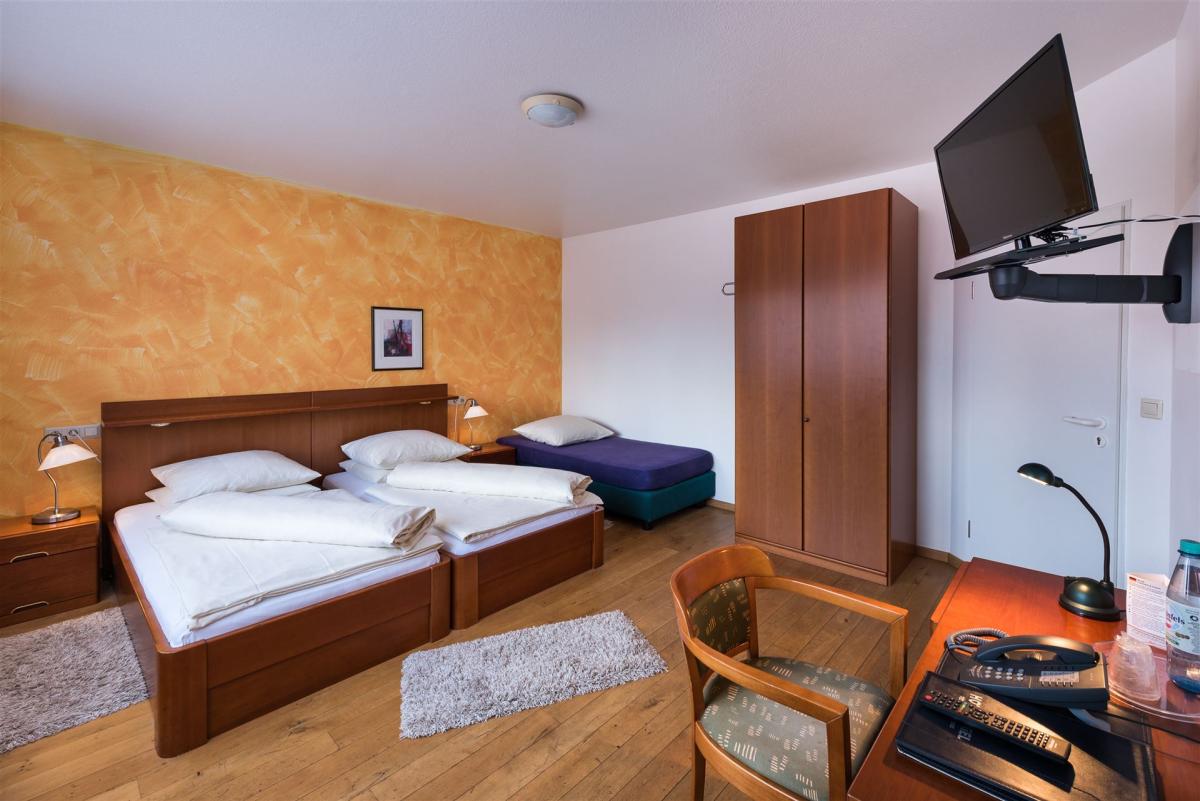The picture shows an economy double room.