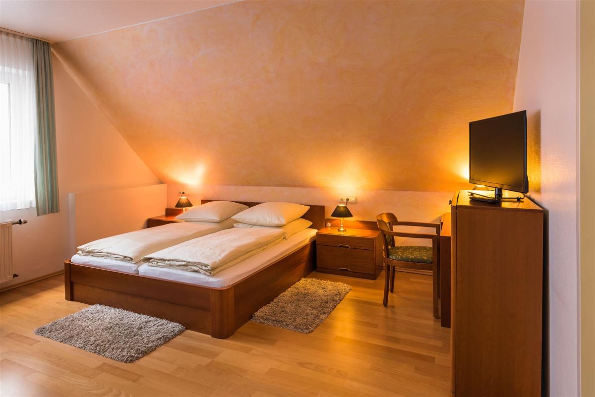 The picture shows an economy double room.