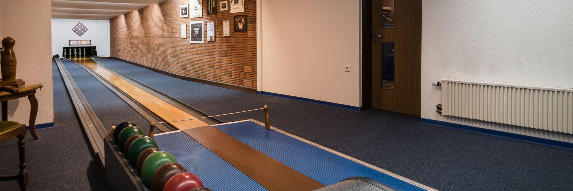 Photo of the bowling alley seen from the table.