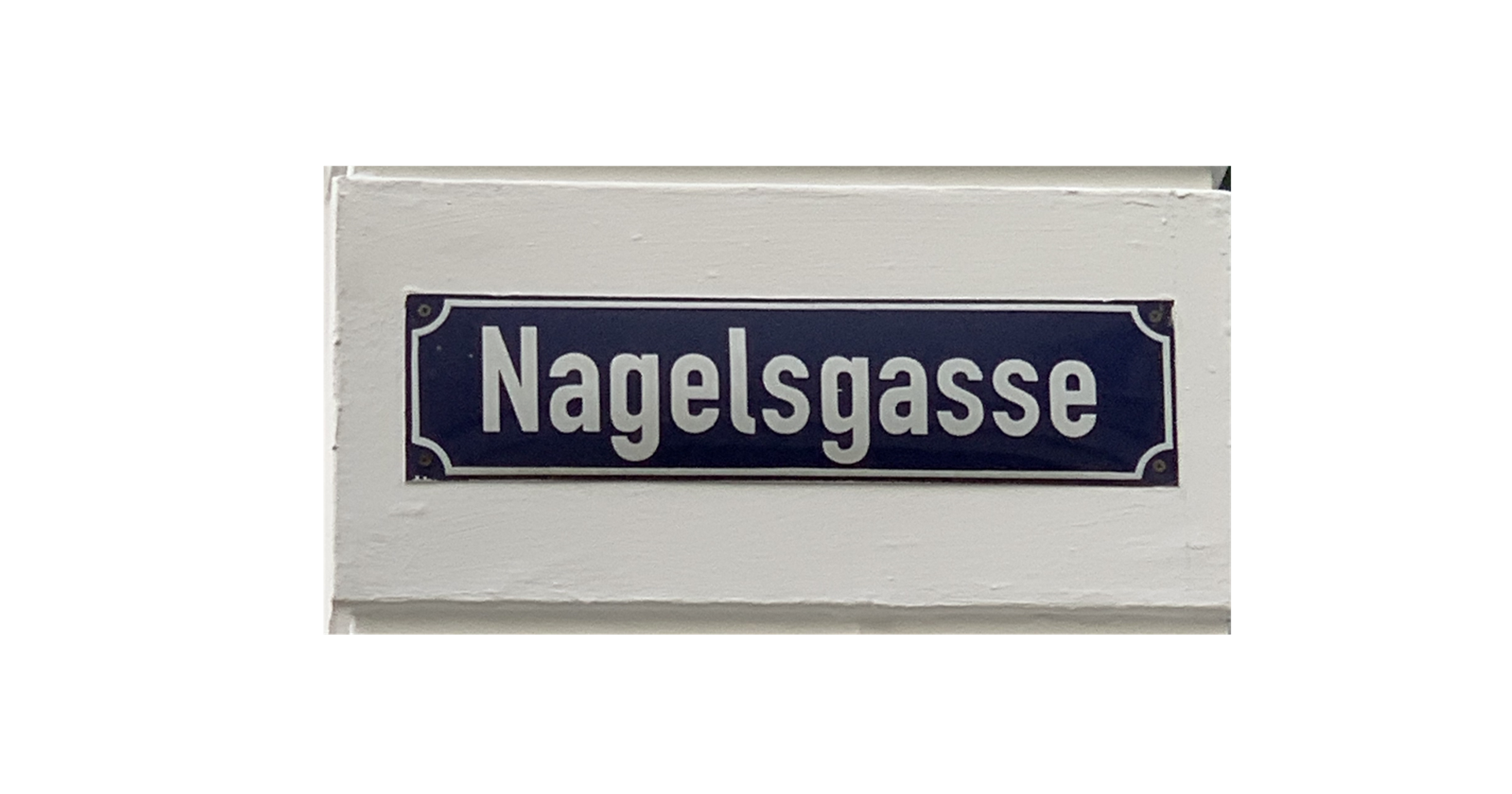 Photo shows a street name sign with "Nagelsgasse."