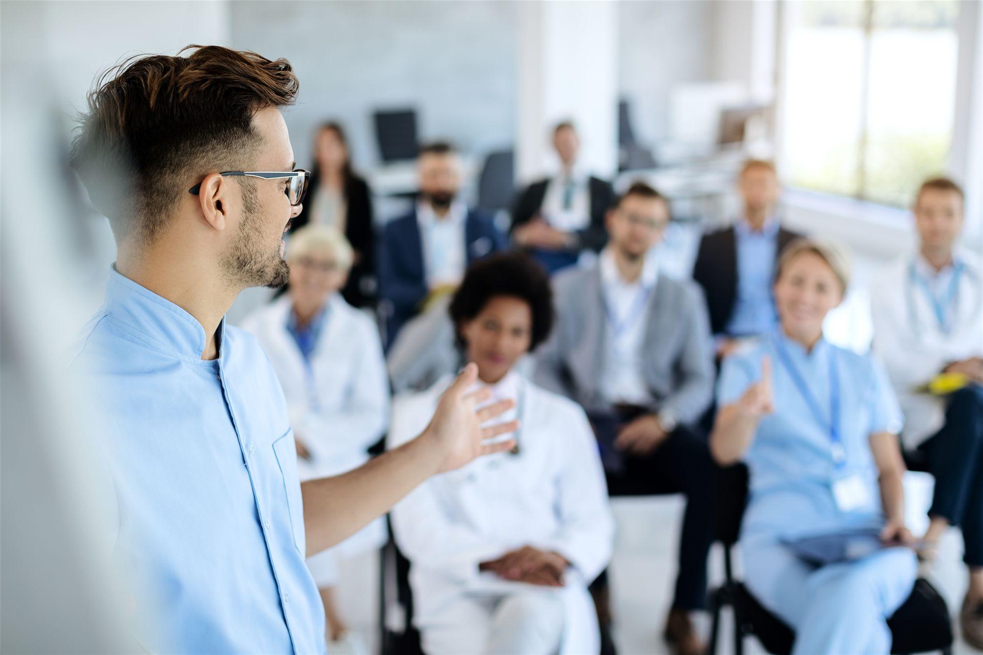 Meeting participants listening attentively to the instructor.